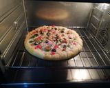 A picture of step 2 of Cheesy Chicken tikka pizza.