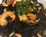 A picture of step 5 of Squid Ink Tagliolini with Grilled Shrimp, Mustard Pesto, and Toasted Pine Nuts.