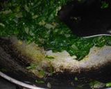 A picture of step 3 of Palak kofta in red Gravy with Garlic naan.