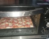 Foto langkah ke 6 dari resep Pizza Roti Ekonomis.