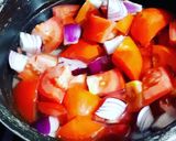 A picture of step 1 of Hydrabadi Tomato kutt with boiled rice🍅.