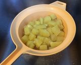 Une image de l'étape 4 de Pommes de terre gratinées au pecorino,ail et persil.