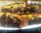 Foto del paso 8 de la receta: Bizcocho marmoleado de naranja y cacao, con esencia de vainilla