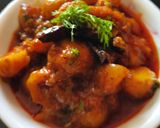 A picture of step 4 of Achari Aloo/potato.