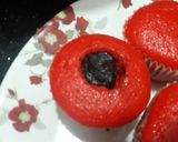 A picture of step 3 of Red cup cakes with chocolate center.