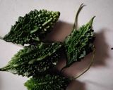 A picture of step 1 of Kerala style karela masala curry.