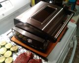 A picture of step 1 of Electric smokeless grill.