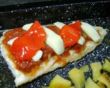 Foto del paso 8 de la receta: Merluza a la pizza con papas crocantes