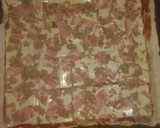 Foto del paso 7 de la receta: Pizza de atún, jamón york, queso rulo de cabra, bacon y cebolla