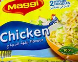 A picture of step 2 of Chicken schezwan Maggi noodles and tossed boiled egg with Maggi seasoning.