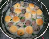 Foto del paso 4 de la receta: Albóndigas de brandada de bacalao en salsa verde con almejas