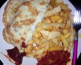 A picture of step 2 of Potato chips and fried egg.