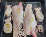 Foto del paso 1 de la receta Lubina con calamar al ajillo
