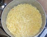 A picture of step 2 of Fried eggs with stir fry noodles.