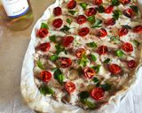 Foto del passaggio 7 della ricetta Carpaccio di Ombrina con pomodorini al forno