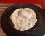 A picture of step 5 of Mashed brinjals with bajra roti baingan ka bartha and bajre ki roti.