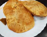 A picture of step 10 of Punjabi Thali - Chana Masala Curry with Methi Masala Puri.