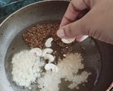 A picture of step 9 of Suji coconut balls.