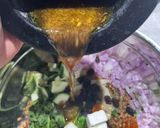 A picture of step 4 of Spelt summer salad and pomegranate molasses dressing.