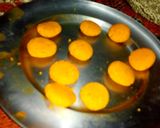 A picture of step 1 of Orange rasmalai.