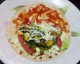 A picture of step 9 of Spinach & mix veg wraps.