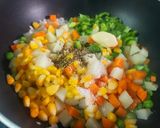 A picture of step 3 of Baked Sweet Corn and Vegetables in White Sauce.