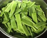 Foto del paso 3 de la receta Judías verdes con cebolla y jamón gratinadas