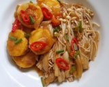 A picture of step 5 of Stir-Fried Enoki Mushrooms and Tofu with Oyster Sauce.