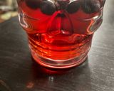 A picture of step 3 of Haskap Sangria (using Haskap berry wine).