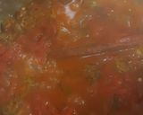 A picture of step 5 of Μπάμιες/Bamies--Greek style braised okra with tomatoes.
