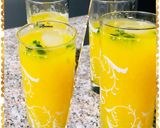 A picture of step 1 of Muddled mint orange juice.