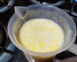 A picture of step 2 of Doodh daliya in pressure cooker (with different toppings).