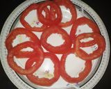 A picture of step 1 of Three colour egg stuffed tomato.