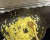 A picture of step 2 of Garlic Soup with Caramelized Onion, Leek, and Goat Cheese.