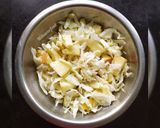 A picture of step 2 of Cabbage and apple salad.