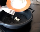 Foto del paso 3 de la receta: Arroz con calamares de lata