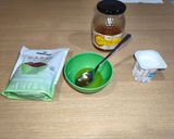 Foto del paso 1 de la receta Yogurt con uvas pasas y miel