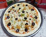 A picture of step 2 of Chicken Tikka Pizza 🍕🧀🍕.