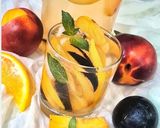 A picture of step 2 of Orange, Nectarine, Plum, and White Wine Sangria.