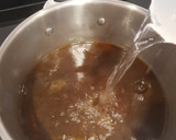 Foto del paso 3 de la receta: Arroz integral con rape, ajetes y alcachofas (para vagos)