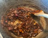 A picture of step 4 of Red onion chutney with nuts and raisins.