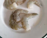 Foto del paso 6 de la receta: Arroz caldoso con atún y langostinos