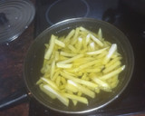 Foto del paso 5 de la receta: Cinta de lomo en escabeche con pimiento asado y papas fritas