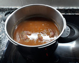 Foto del paso 4 de la receta: Lentejas con costillas adobadas, espinazo y manitas de cerdo