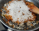 Foto del paso 4 de la receta: Paella de bacalao y alcachofas
