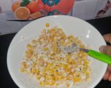 A picture of step 2 of Crispy masala Corn 🌽.