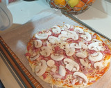 Foto del paso 5 de la receta: Pizza preparada por la pequeña de la casa