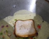 অমলেট র‍্যাপড টোস্ট (omelette wrapped toast recipe in Bengali) রেসিপি ধাপ - 5 ছবি
