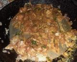 A picture of step 4 of Anda Bhurji.