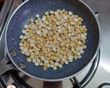 A picture of step 1 of Roasted Red Poha Chiwda.